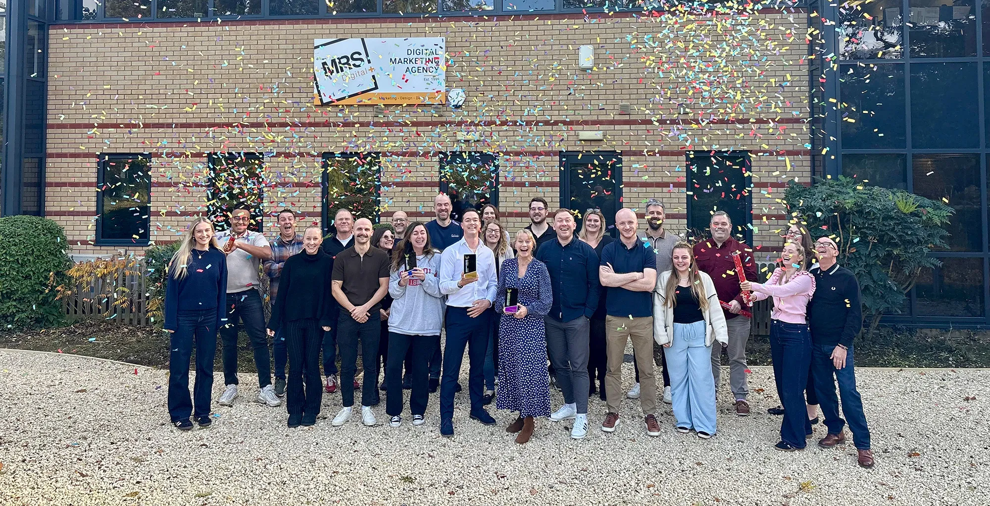 AI SEO - MRS Digital Celebrate x3 Awards outside HQ